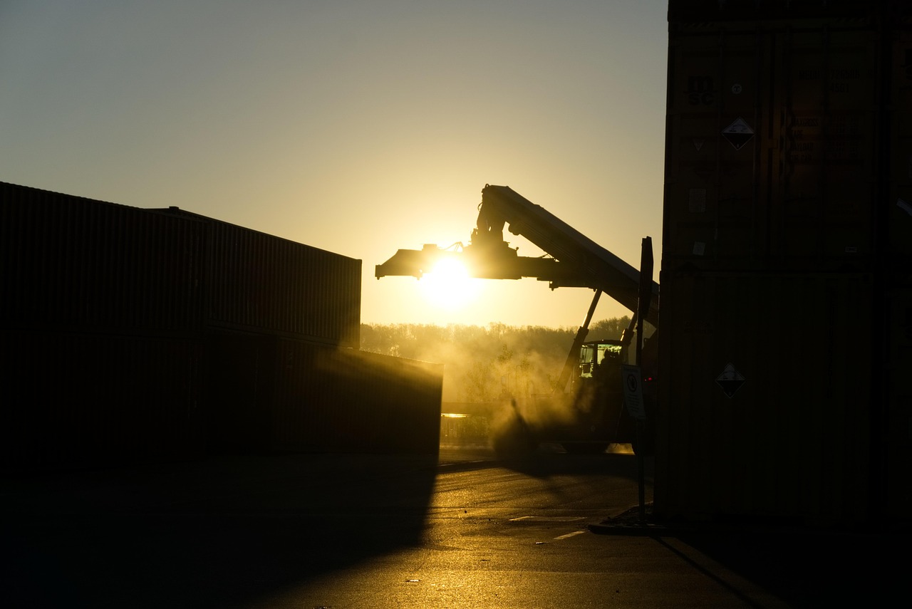 container terminal cranes sunset